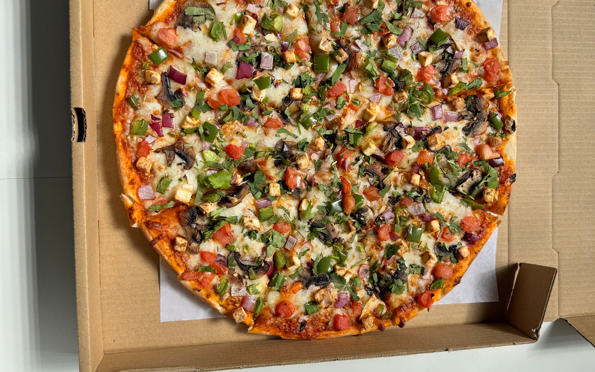 Try Our Famous Tikka Masala Pizza – A Flavorful Twist on Tradition